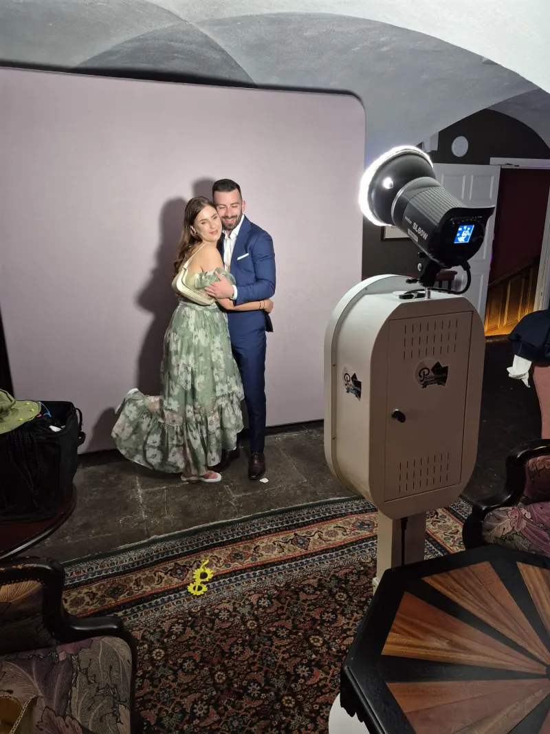 Photo booth setup at a wedding venue with professional lighting