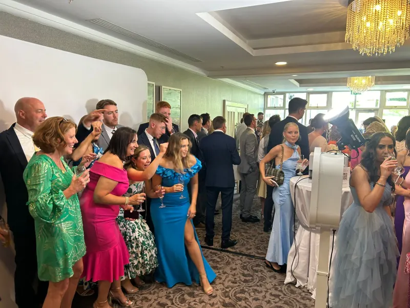 Guests queueing for photo booth at wedding venue in Ireland
