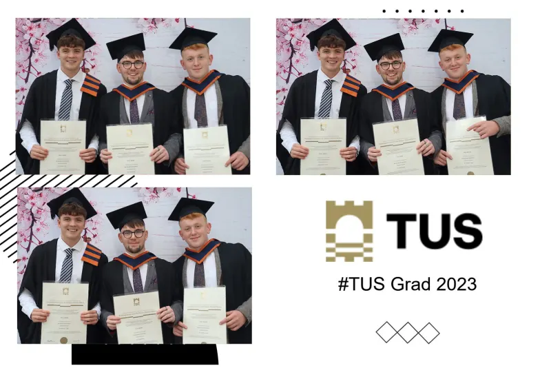 TUS graduation photo booth with students in caps and gowns holding degrees