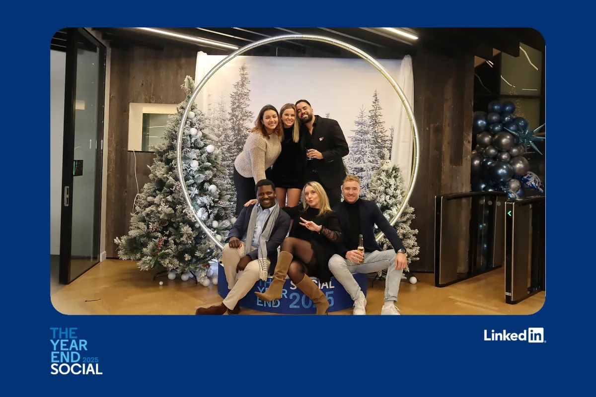 LinkedIn Year End Social branded photo booth with guests posing