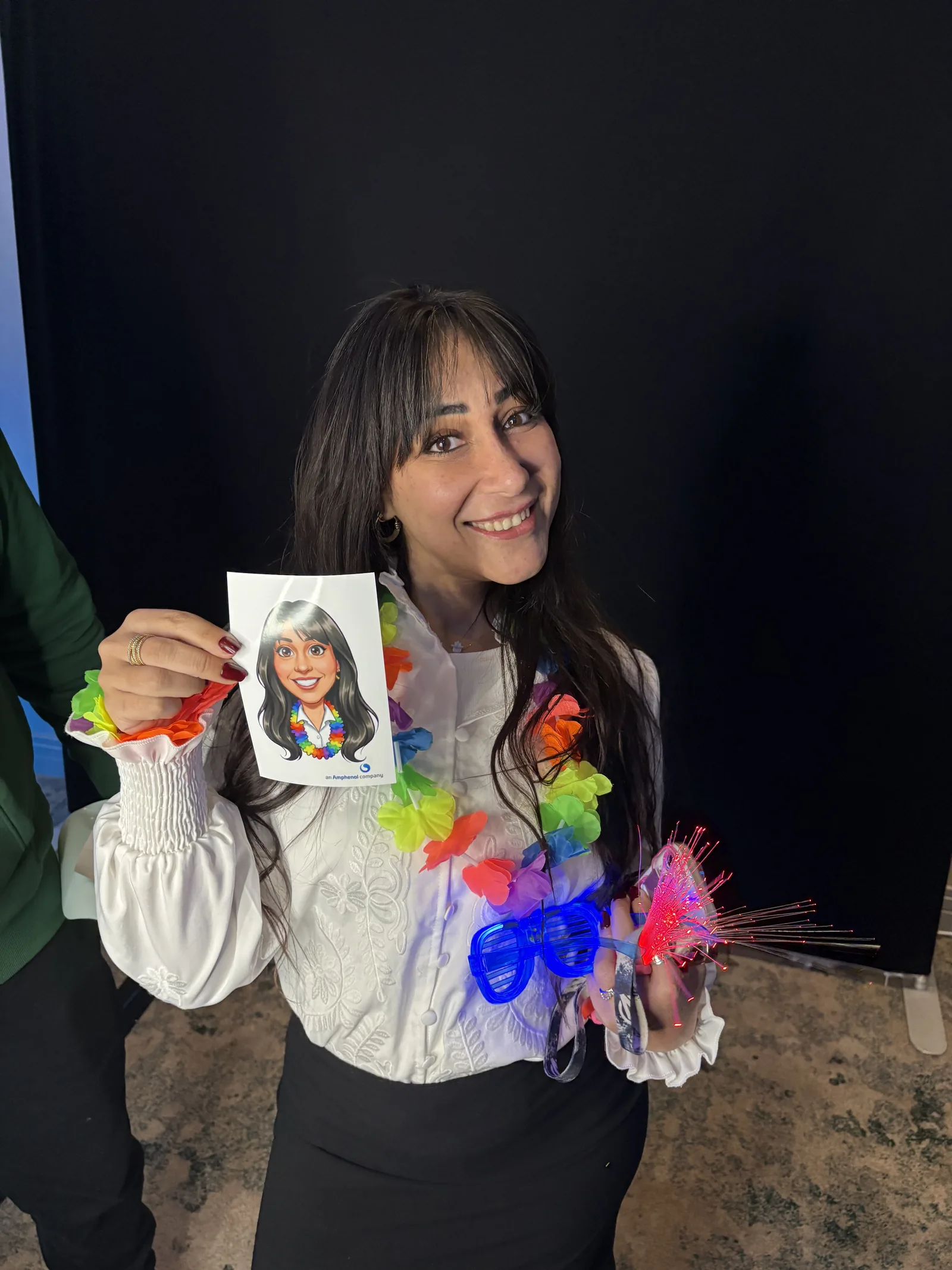 Wedding guest holding a cartoon caricature print produced by the Photobooth Guys AI booth in Ireland