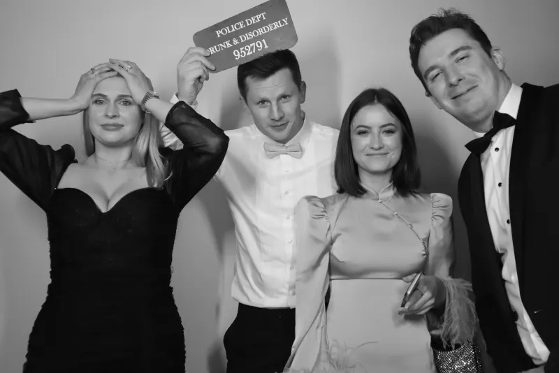 Wedding guests posing together at a photo booth in the Westmeath Lakelands, Ireland